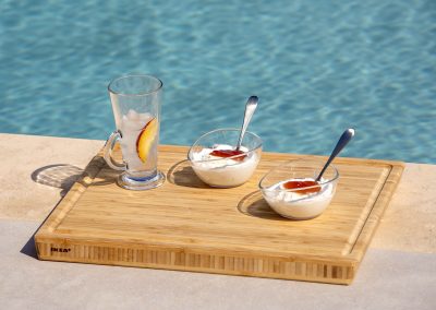 Luxury villa pool deck with loungers overlooking the Ionian horizon