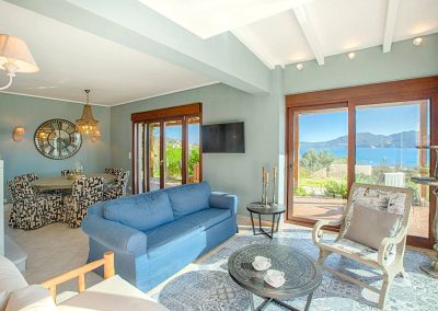 Stylish lounge area with floor-to-ceiling windows
