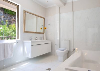 Refined bedroom with king-size bed and balcony access