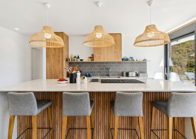 Bright open-space villa interior in Nikiana with panoramic glass walls