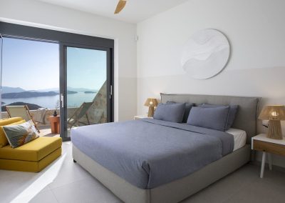 Sophisticated villa lounge in Ammousa with floor-to-ceiling windows