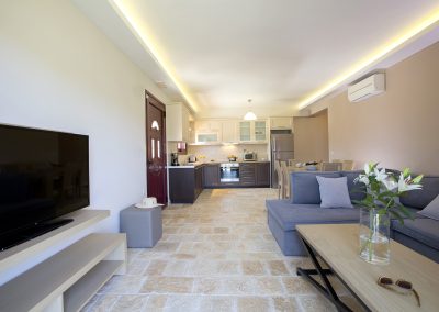 Spacious luxury bedroom suite with sea-facing balcony in Nikiana villa