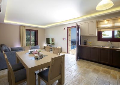 Spacious luxury bedroom suite with sea-facing balcony in Nikiana villa