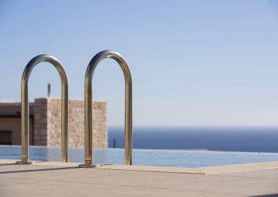 Sunset-facing pool terrace at Sivota villa with endless Ionian backdrop