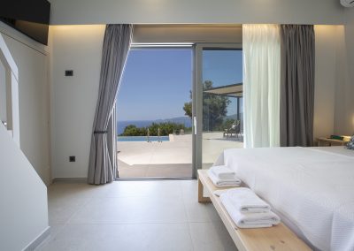 Elegant master suite with natural light and modern design
