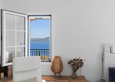Luxury sea view master bedroom in Lefkada villa with elegant natural textures