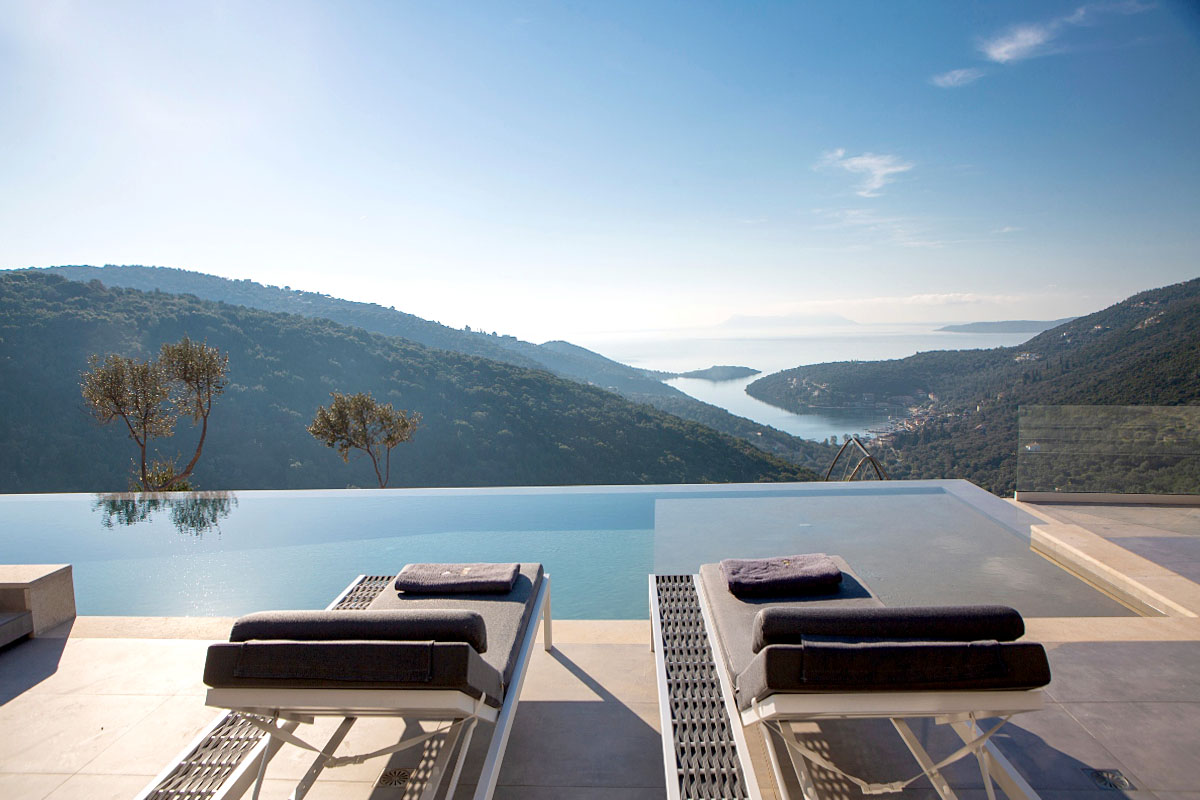 Designer overflow pool at Sivota hillside villa with endless blue sea backdrop