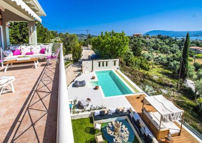 Designer overflow pool at Sivota hillside villa with endless blue sea backdrop