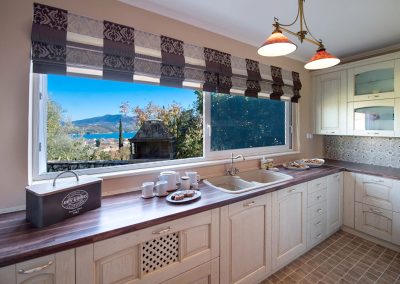 Luxury sea view master bedroom in Lefkada villa with elegant natural textures