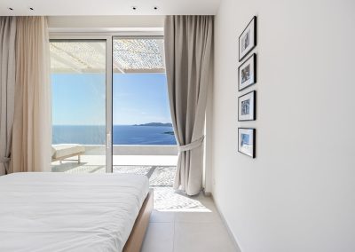 Spacious Villa Mia Rose bedroom in Amousa with elegant details and calming views over the Ionian Sea