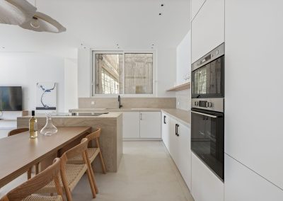 Villa Mia Rose kitchen and lounge space with elegant interiors and bright open plan layout in Lefkada