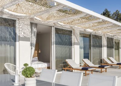 Luxury outdoor dining area at Villa Mia Rose with sea views and peaceful island surroundings
