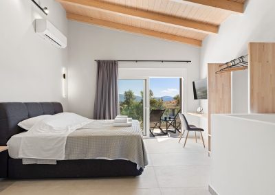 Relaxing bedroom at Villa Margarita Apolpaina with modern villa aesthetics